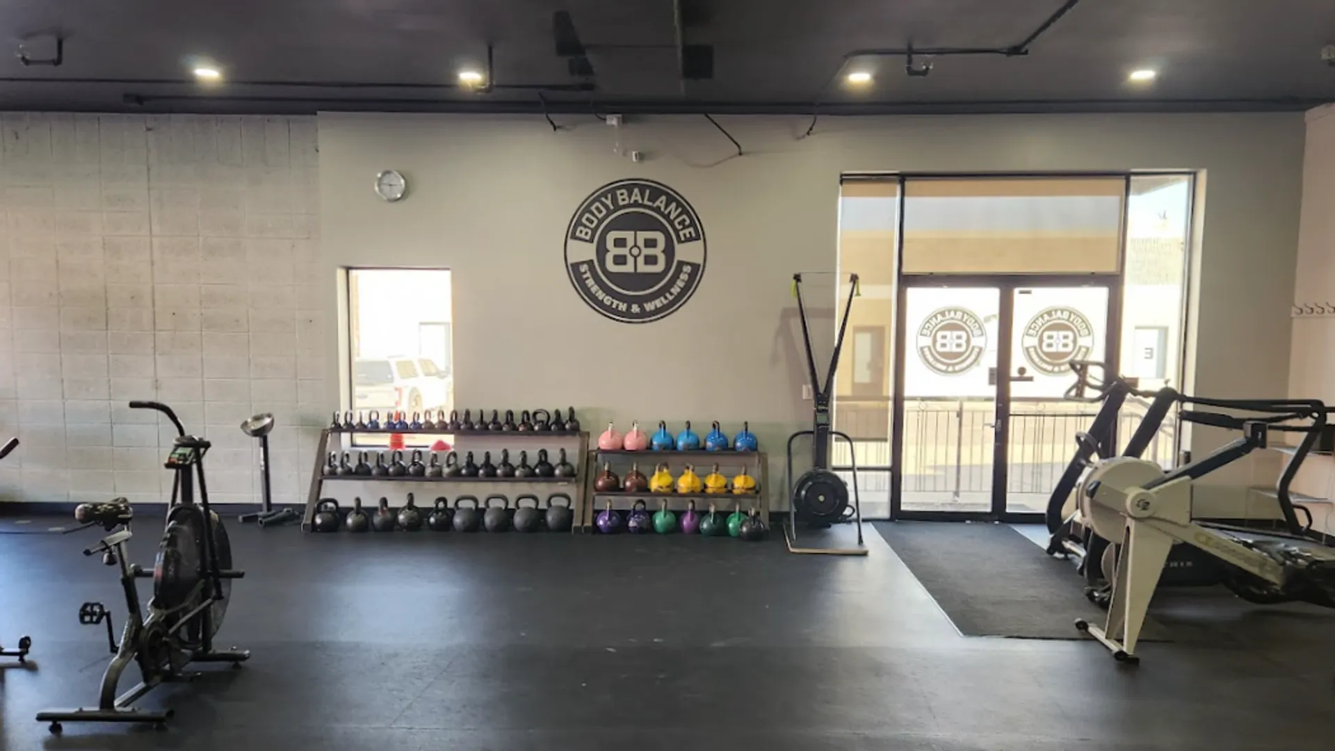 Inside Body Balance Strength & Wellness — open training floor, kettlebells and natural light in East Boulder